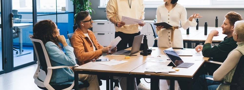 Company working with iPads in an office