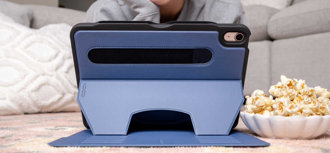 Smiling lady watching her iPad with ZUGU case